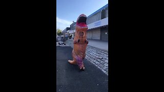 Dude in Glasgow wears T-Rex costume for safety measures