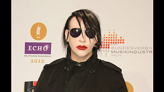 Marilyn Manson is wanted on an arrest warrant for allegedly shooting snot on a camerawoman