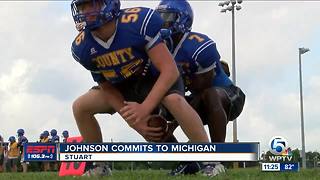 Johnson commits to Michigan