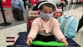 Neenah Family on their way back home from China