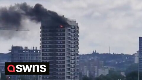 Fire breaks out at top of 17-storey London tower block