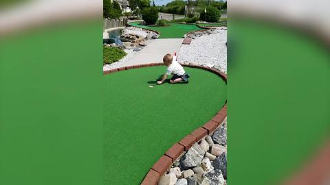 Little Boy Bends Rules Of Mini Golf