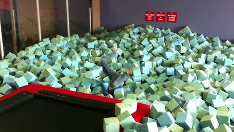 "Hilarious Boy Jumps in Foam Pit and Gets Stuck Upside Down"