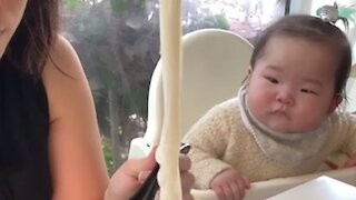 Adorable Baby Can't Stop Drooling When Watching Mom Eat Noodles