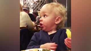 "Baby's First Food: Hilarious Reactions"