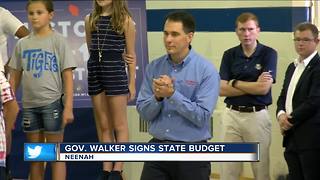 Governor Walker signs $76 billion state budget into law nearly three months late