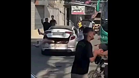 NO innocents in Gaza: Look how joyfully they all chase the car with an Israeli hostage in trunk