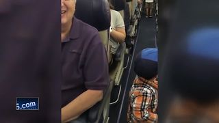 Child cheers up passengers