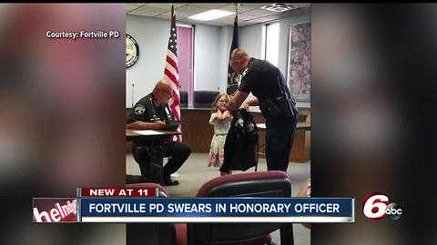Fortville Police make little girl's day by swearing her in as an "honorary officer"