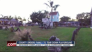 Parents may have to remove backyard playground after neighbor's complaint