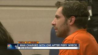 Suspect charged with an OWI after fiery crash