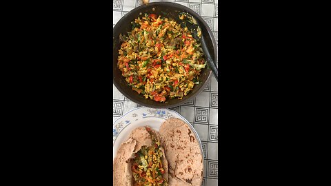 Colourful breakfast, veg stir fry with pitta bread