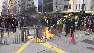 Hong Kong protesters set up roadblocks, clash with police