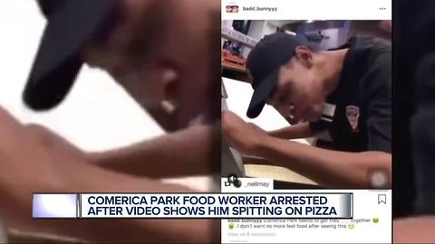 Comerica Park food services employee seen spitting on pizza in police custody