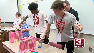 Shrine Bowl athletes interact with Shriners Hospital patients