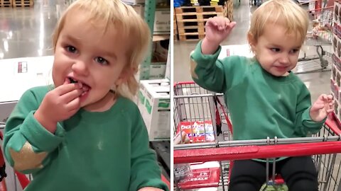 Little girl shows off her best shopping cart dance moves