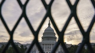 Workers Begin Installing Fence Around U.S. Capitol