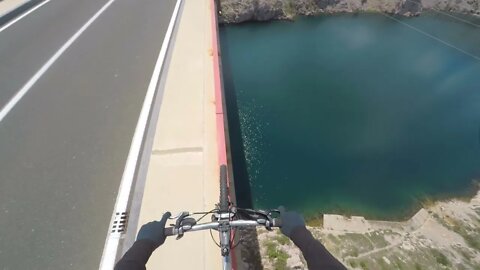 Riding a bike on a 80m high rail
