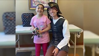 Doctor dresses up in different costume every time he sees young patient