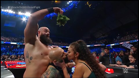 Braun Strowman enlists the help of mistletoe and ring announcer Samantha Irvin to revive Ricochet