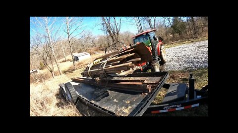 4wd compact tractor loading oak barn wood-antique picks at our 38 acre Southern Illinois investment