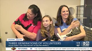 Three generations volunteering at Valley animal shelter