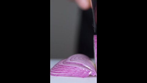 Title: "Mastering the Art of Onion Cutting: Perfectly Equal Slices Every Time!"