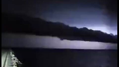 SUSPICIOUS LOW SPRAYED CHEMTRAIL SPOTTED IN LIGHTNING STORM