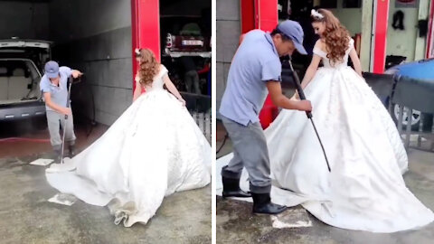 Bride washes her dress at car wash
