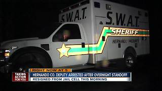 Detective arrested following 11+ hour standoff with SWAT