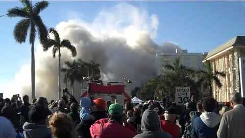 Demolition Of Thirty Story Building Causes Thick Layer Of Dust And Smoke