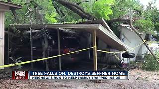 Neighbors rescue family of six after tree crushes home, trapping them inside