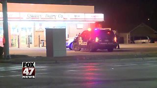 Police investigating two armed robberies in Lansing