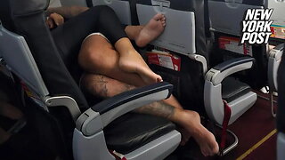 Passenger horrified after barefoot flyers lie on top of each other during flight