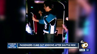 Passengers climb out windows after shuttle ride