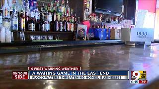 Ohio River floodwaters threaten businesses, homes