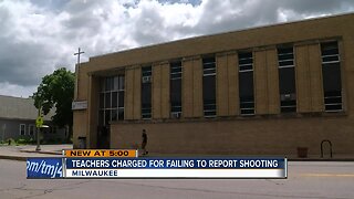 Teachers charged for failing to report shooting