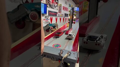 Slot car drags: Ranchero Vs. C7 Corvette 1/8 mile.