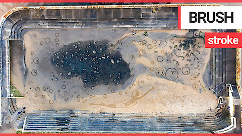 Artist uses derelict outdoor pool to create giant sand picture of her late grandmother