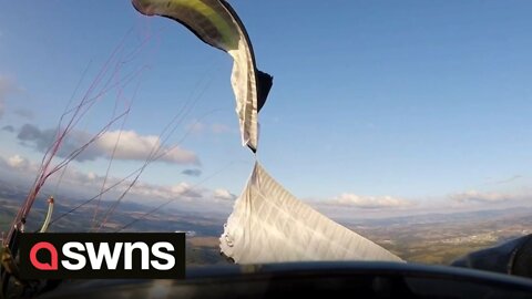 Paraglider nearly plunges 2,500 feet after the wing on his paramotor malfunctions mid-flight