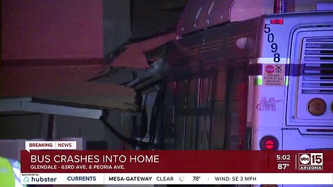 Bus crashes into home near 67th and Peoria avenues