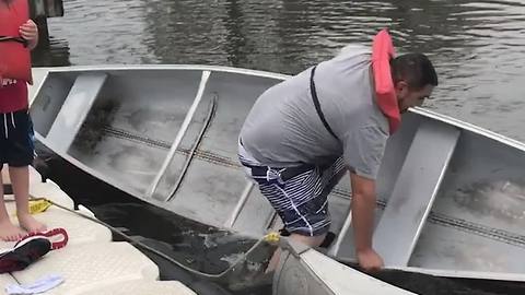 Guy Struggles To Get In Rowing Boat