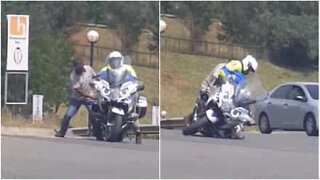 Police officer shows how easy it is to get on a motorcycle