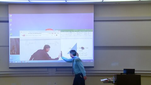 Mathematics professor fixes the projector screen (April Fools' prank)