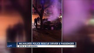 Milwaukee police rescue two from smoking car