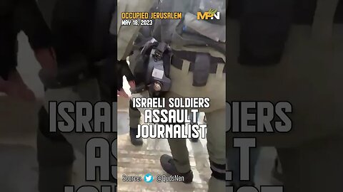 Israeli occupation soldiers assault a Palestinian journalist