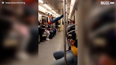 Spider-Man entertains subway passengers