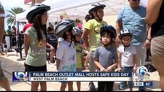Free bike helmets distributed at "Safe Kids Day" event in West Palm Beach