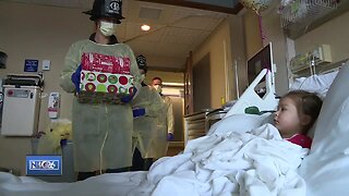 Green Bay firefighters donate gifts to children patients at HSHS St. Vincent Children's Hospital