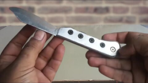 Making a pocket folding knife [ from rusted leaf spring and Bimetal Band Saw Blade ]